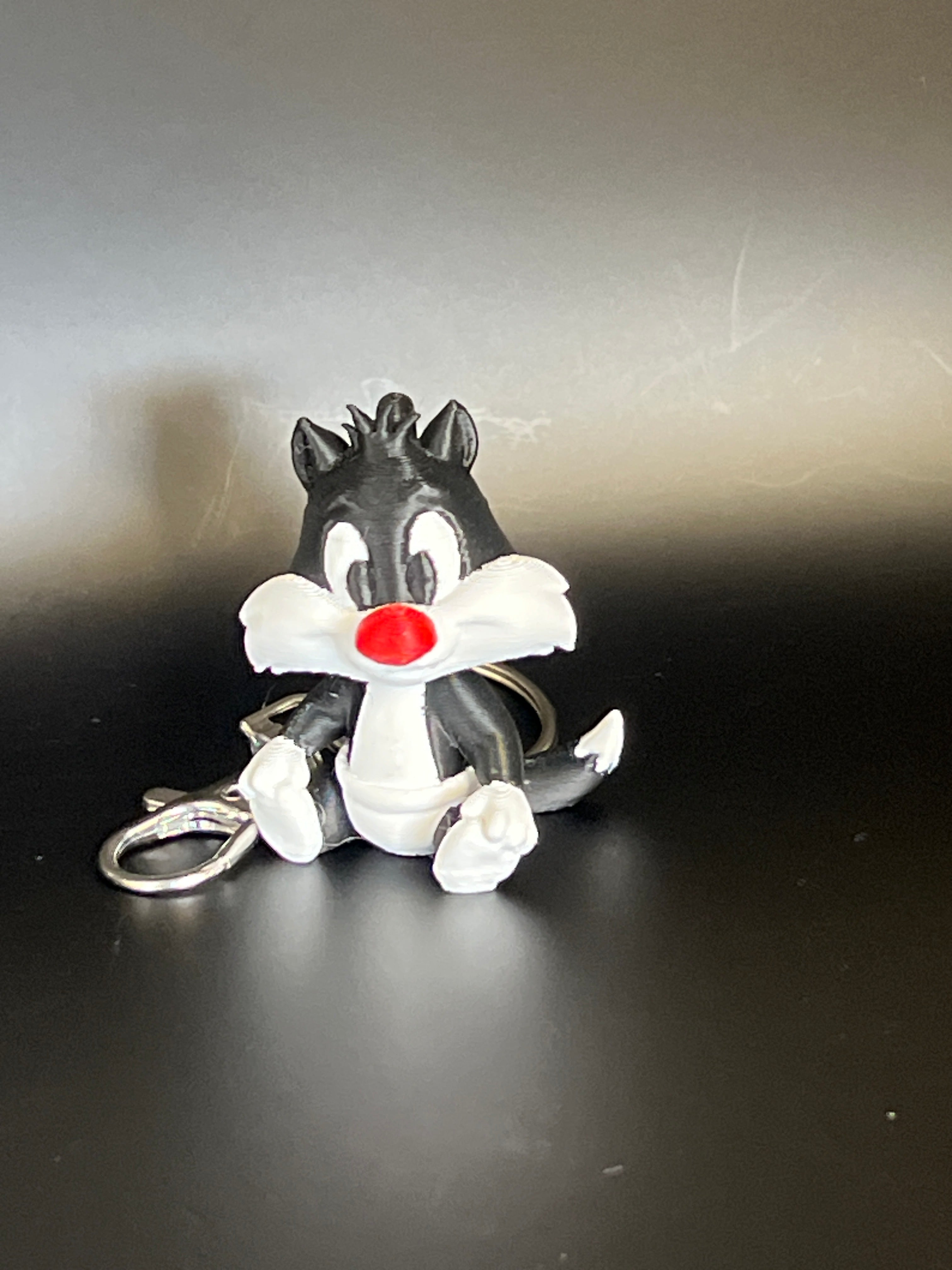 Classic Looney Tunes vibes, now in your pocket. Sylvester Mischief on the go