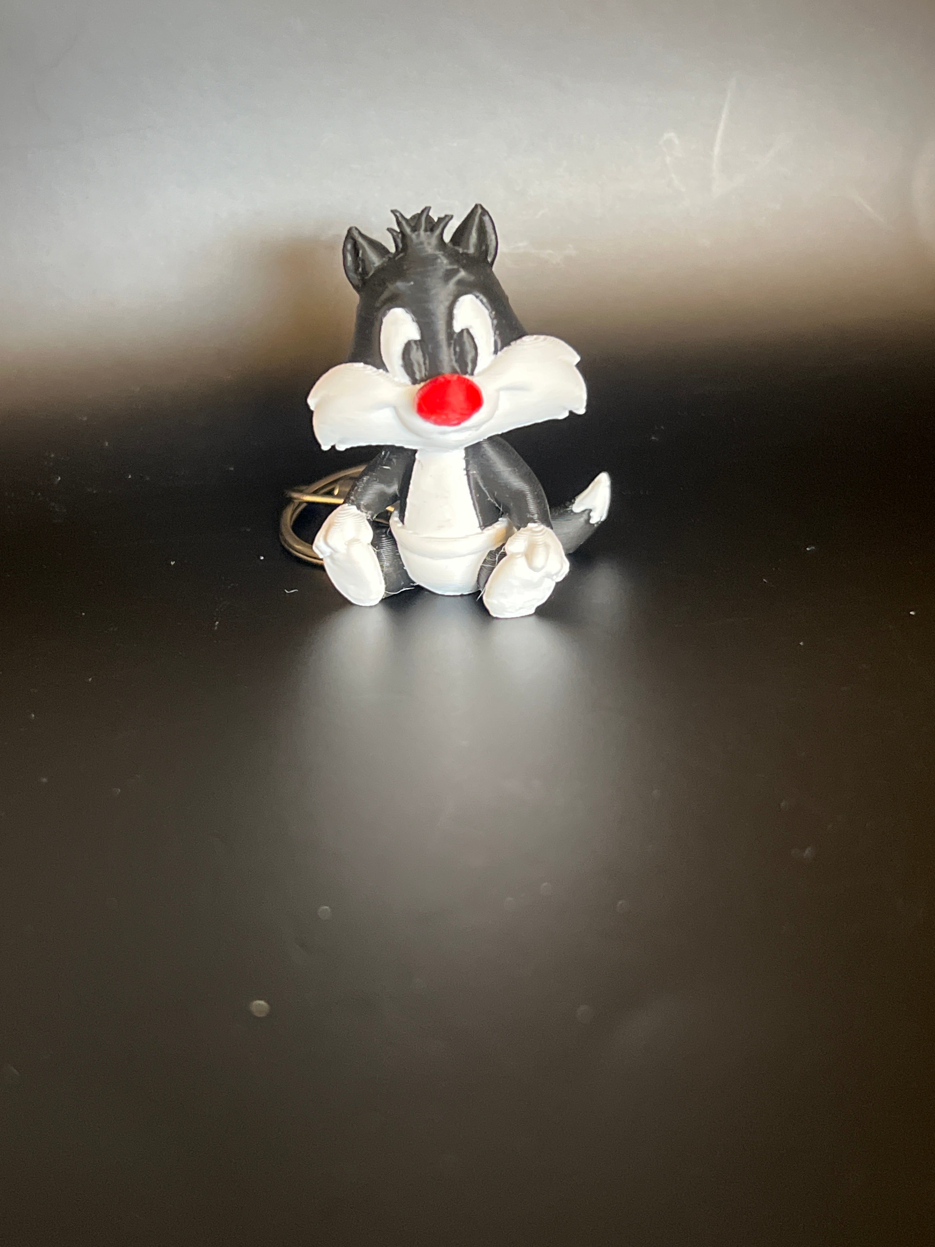 Classic Looney Tunes vibes, now in your pocket. Sylvester Mischief on the go