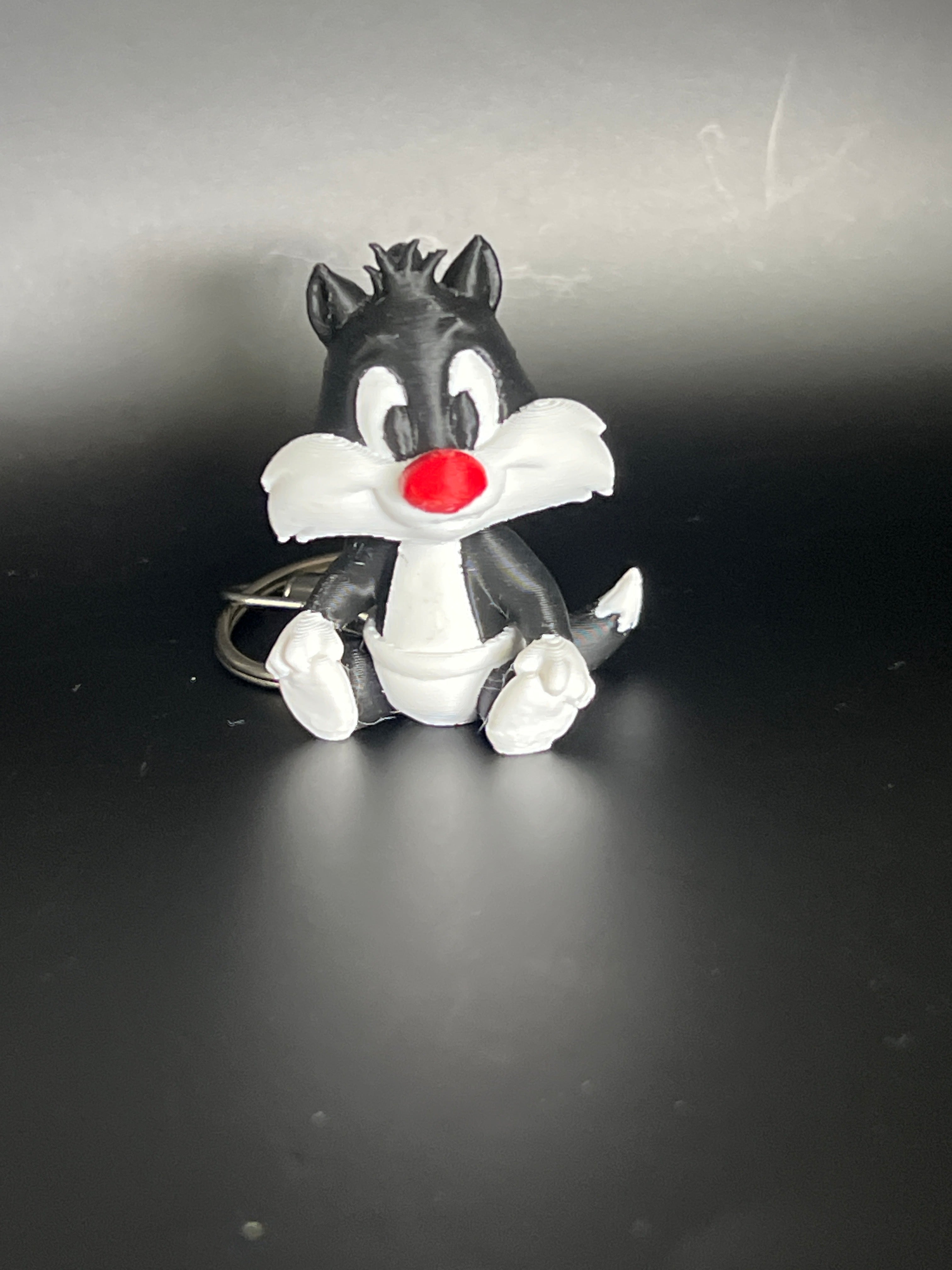 Classic Looney Tunes vibes, now in your pocket. Sylvester Mischief on the go